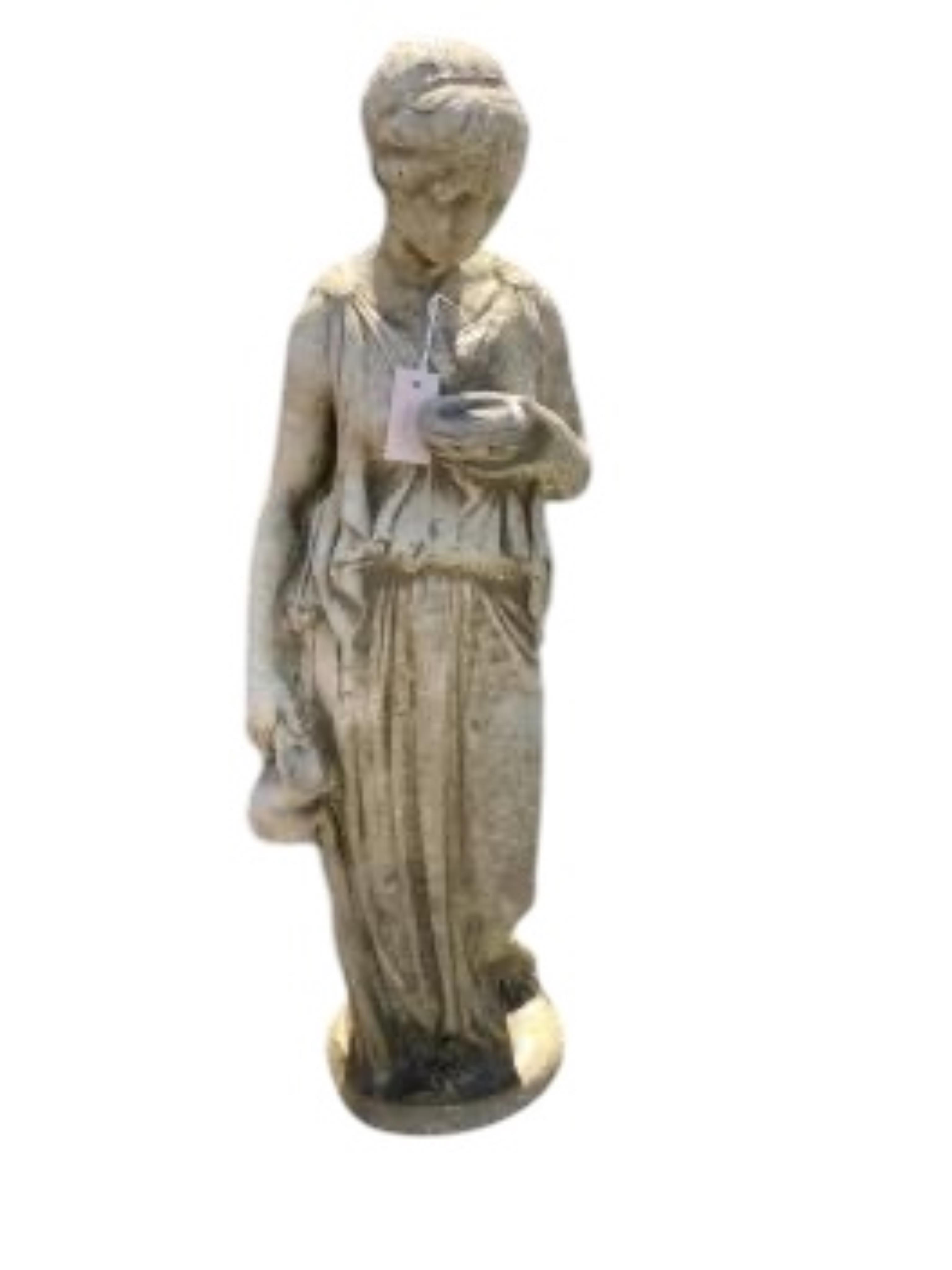 A reconstituted stone female water carrier garden ornament, height 106cm